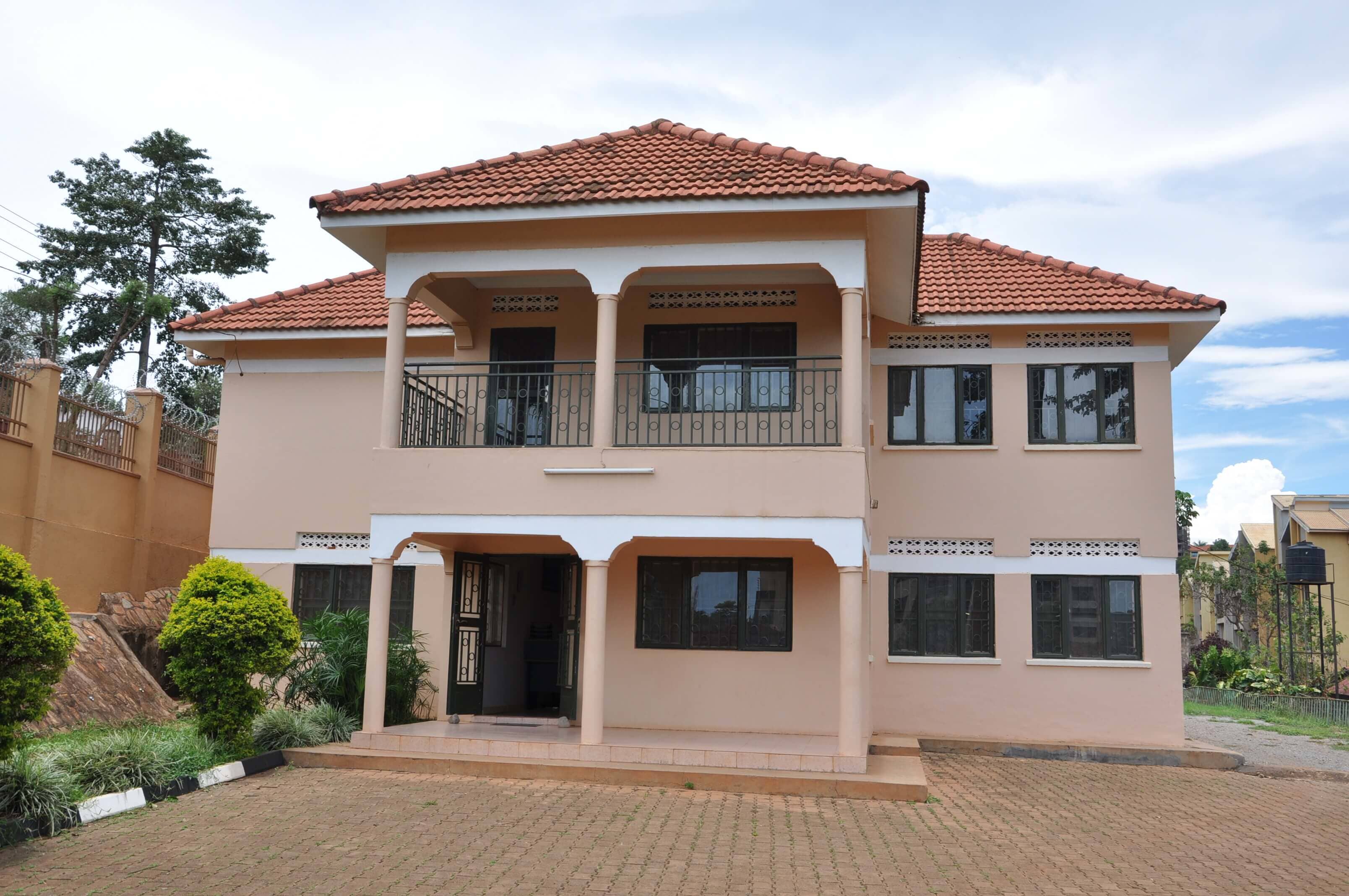 Residentials — residential house with tiled roof and balcony